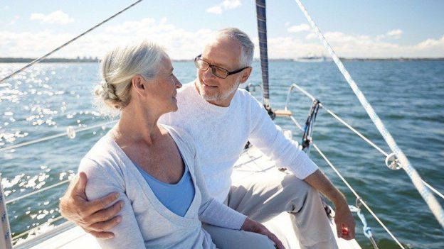 Couple on boat discussing age management medicine