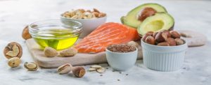 Salmon, avocados, and nuts are a great example of keto style healthy meal prepping