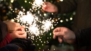 Hands with sparklers in a group