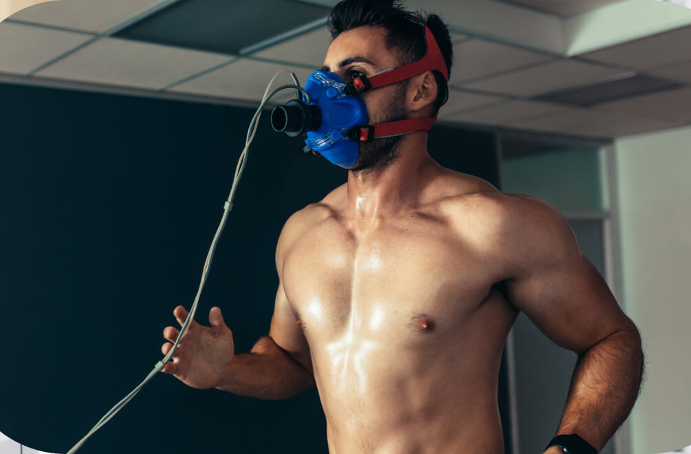 an athletic person wearing a VO2 max testing device during a fitness or sports performance assessment.