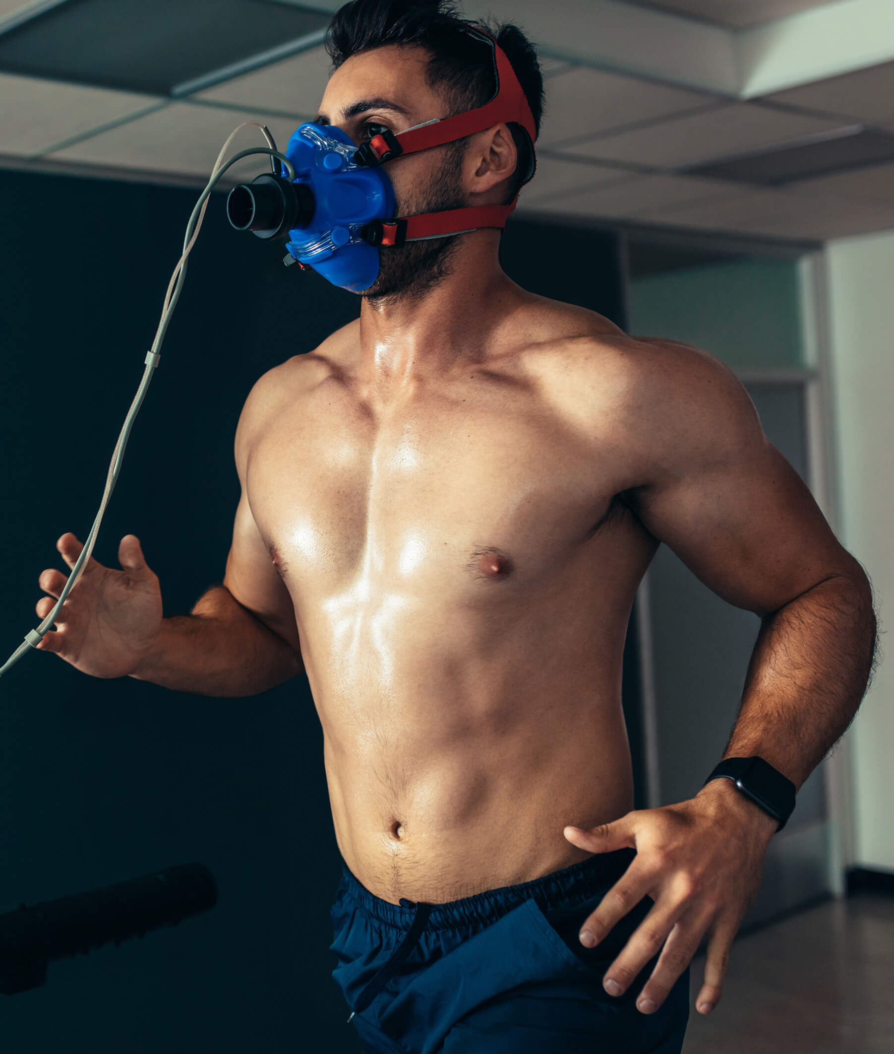 an athletic person wearing a VO2 max testing device during a fitness or sports performance assessment.