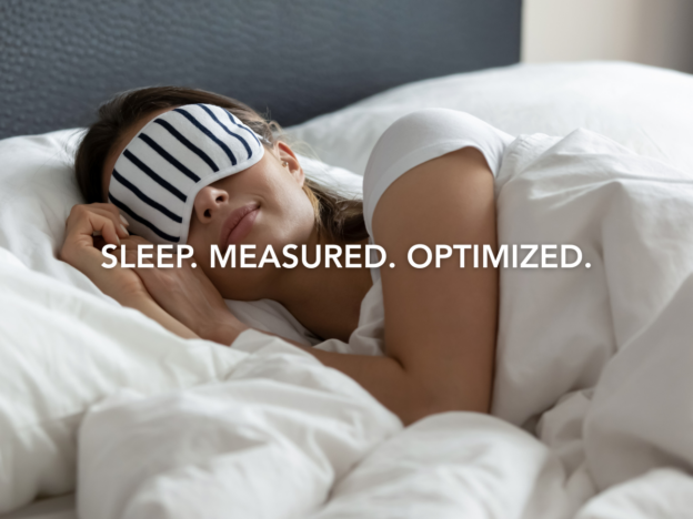 Sleep. Measured. Optimized. Person Sleeping with an Eye Mask.
